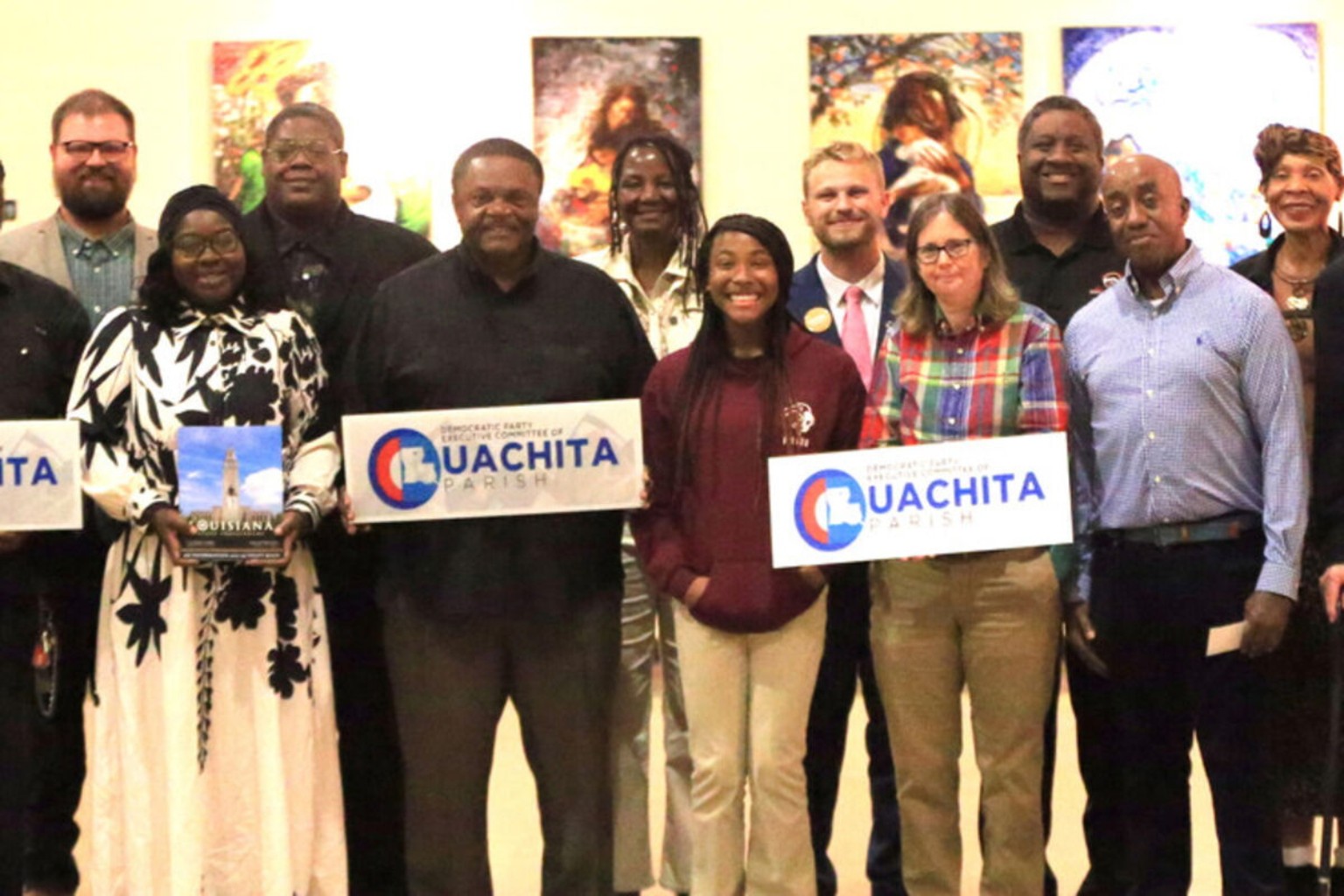 John Robert Badger with attendees at an Ouachita Parish Democratic Party fundraising event